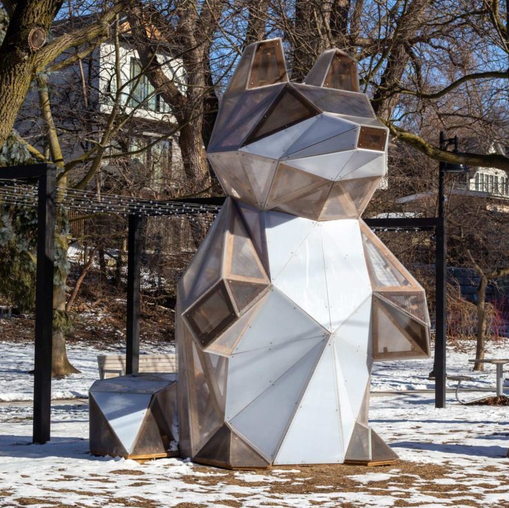 Glass and metal sculpture of Conrad the Toronto Yonge Street Raccoon